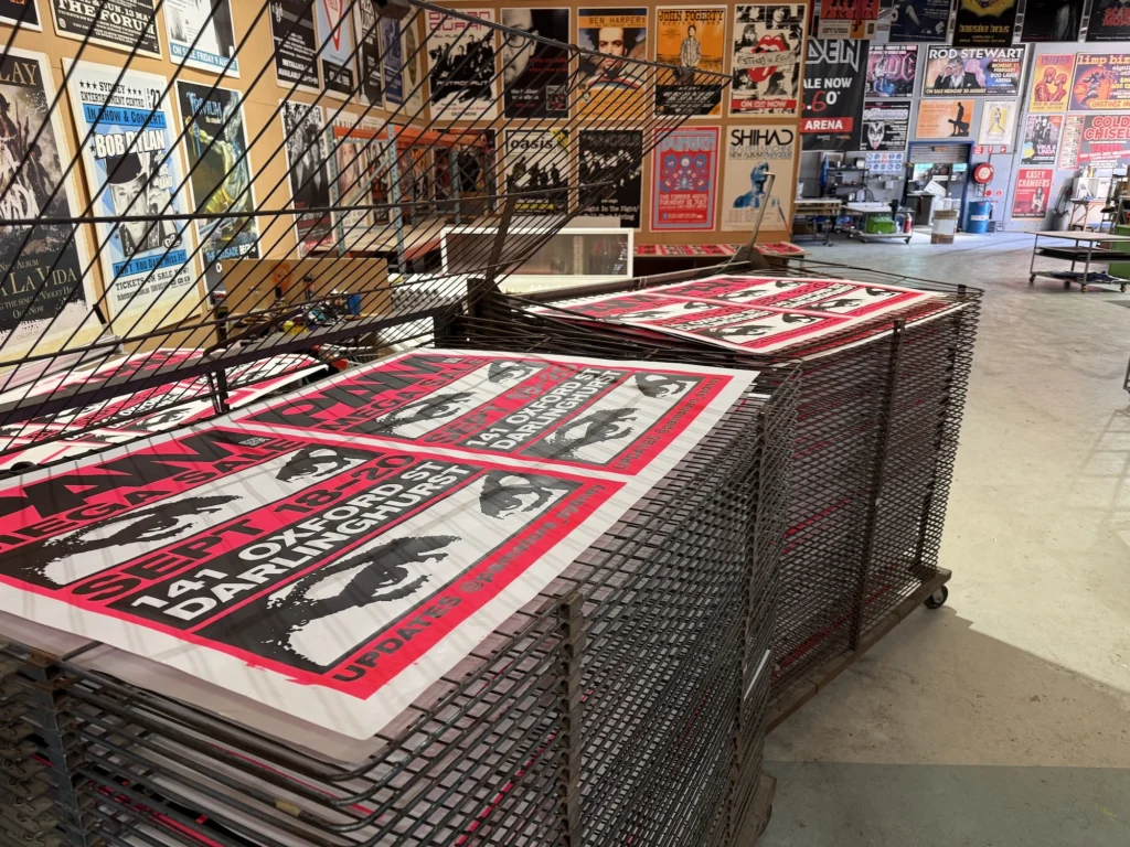 screen printed posters on the drying racks - Rock Posters Thornbury
